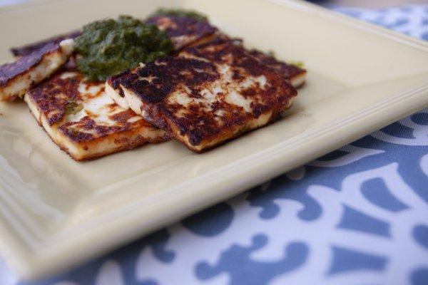 Paneer topped with cilantro chutney