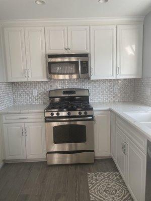 Gorgeous granite countertop and diamond backsplash Done by Fillmore Granite!