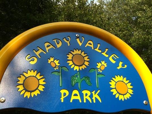 The beautiful sign atop one of the 3 play structures.