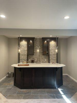 Walk behind wet bar in basement.