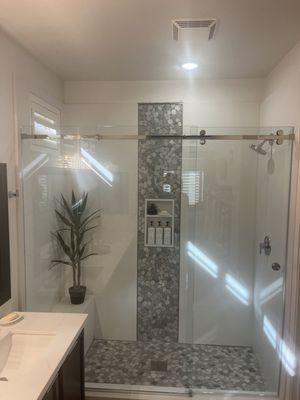 Shower Door by Pinnacle Shower Doors.  Certainly a proven Winner around here. Good job!