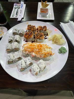 Salmon Roll on the left. Philly Roll on the bottom.  S 5. Hagerstown Roll(8) in the middle. S10. Salmon Amazing(8) at the top.