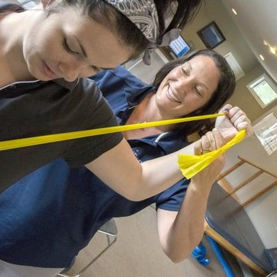 Lacey Physical Therapist, Tracey Rodriguez working one on one with a patient.