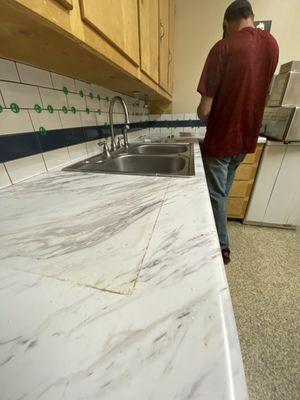 Laying  subway tile backsplash