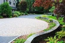 Paver,black top driveway, circle design in the middle