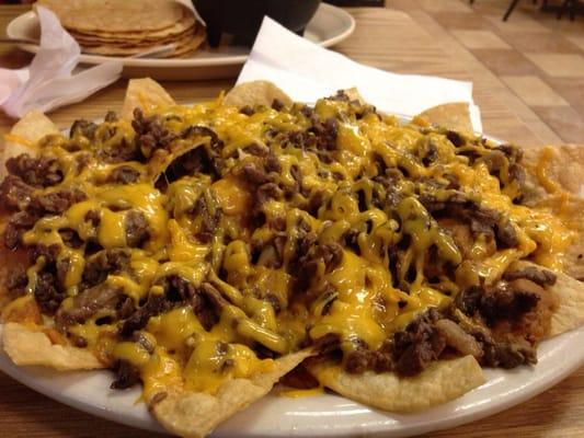 Asada nachos with side of guacamole. Meat was good but all else was boring and as you can see, lacked any fresh ingredients.