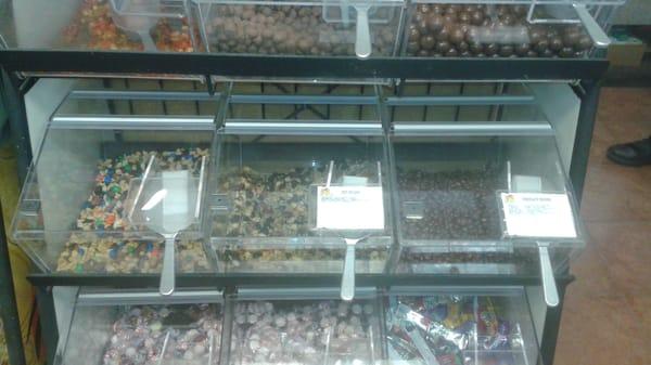 Here are plain pretzels, pretzel bark, almonds, cashews, banana chips, chocolate covered peanuts