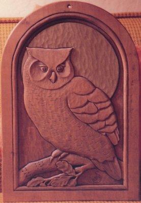 Owl relief wood carving