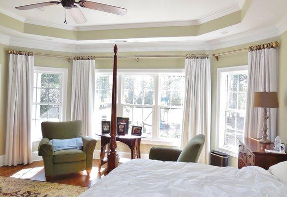 White Linen Ring Curtains in a Bay Window