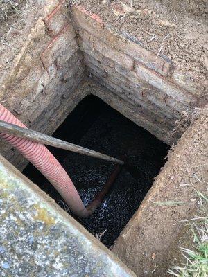 I'll spare everyone the before shots of the septic tank...he's showing me the baffles and how they work. Super thorough.