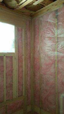 Fiberglass insulation used in a wall application