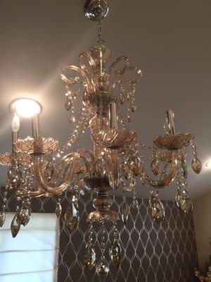 My chandelier that the delivery crew were so nice to put up for me... Otherwise it would be sitting in my room boxed forever!