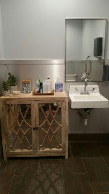 Bathroom with drybar products