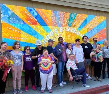 In front of the new Choose Kindness mural.