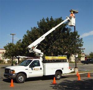 These pole fixtures were replaced with new LED fixtures