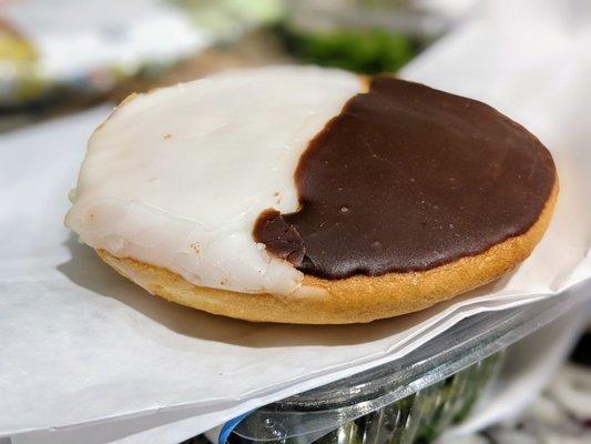 "Black and white cookie." It really wasn't a cookie, but like a doughnut without the middle hole with chocolate and vanilla icing on top.