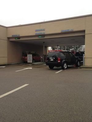 2 teller drive thru from left to right, the 3rd lane for ATM drive up