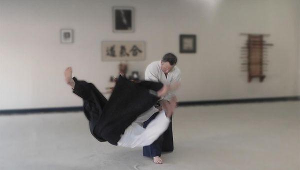 Kotegaeshi - wrist lock that throws the attacker.  Learning how to fall safely is part of the training.