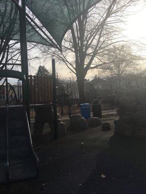 Big kid and little kid playgrounds and a b-ball court