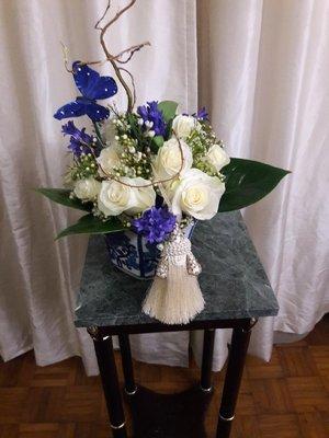 White roses, blue accents