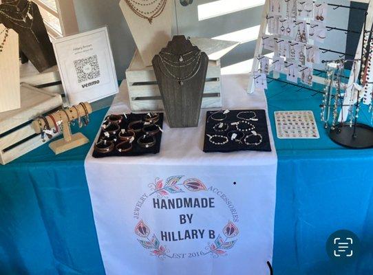 At a pop up event selling my handmade jewelry . All items are made By Me, with care and attention to detail. Custom orders also welcome