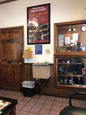 Water fountain and restroom in the air conditioned waiting area.