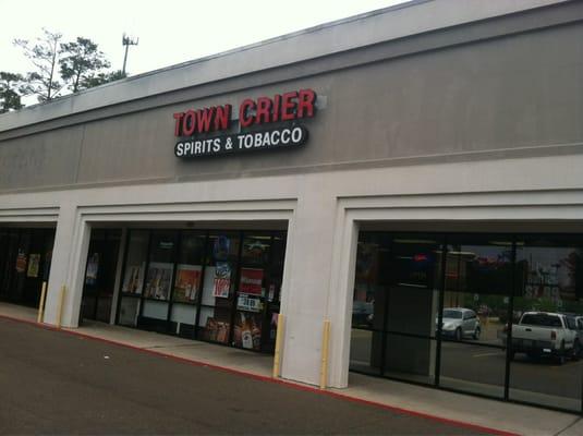 Town crier in strip mall near Little Wal-Mart.