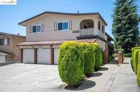 Oak Knoll Fourplex sits atop the highest point of street with fantastic views.