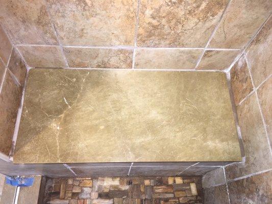 Repaired Marble, looks as it did when new! (Please ignore the sloppy grout and uneven tiles by the home advisor contractor)