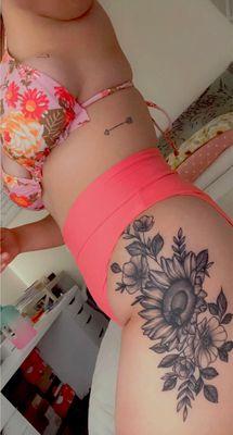 Flower tattoo on hip by @destany