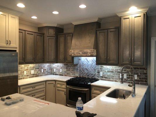 Old St. Louis Brick backsplash Vertical curt to give the appearance of a whole brick.