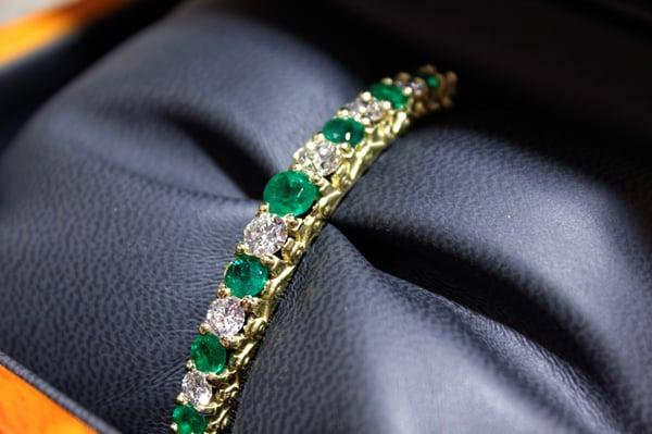 My second custom-made bangle by Christen Jewelers. This one is emerald, diamond and gold. Just as stunning as the other one!