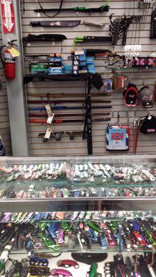 We carry loads of different kinds of pocket knifes, throwing knifes, swords and self defense weapons such as pepper spray and tasers.