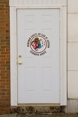 Look for this door to enter. The dojo is one flight up. The workout starts at the first step.