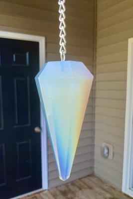 Moonstone pendulum. They have ones made of different stones.