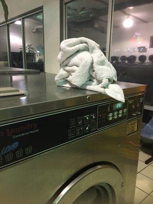 Dirty towel from the floor placed above the machines I'm using during a sweep-through