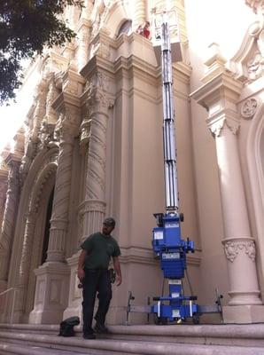 Two of our stellar electricians installing new LED lighting at Mission Dolores Basilica in San Francisco