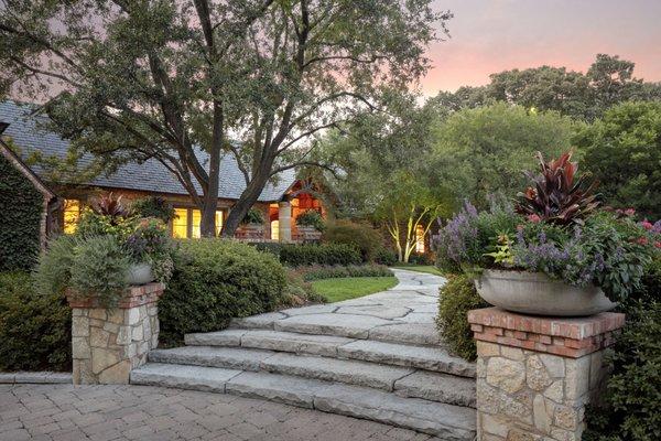 Oversized pieces of leuders roughneck stone were cut by our masons to form these steps and walkway.