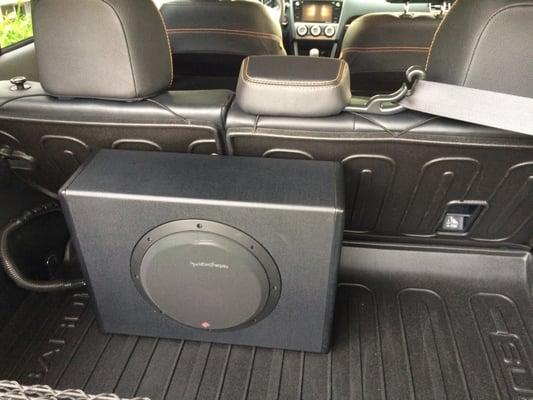 Rockford Fosgate P300-10: Nice all-in-one subwoofer, with enough slack for me to turn it around to easily unhook it when space is needed.