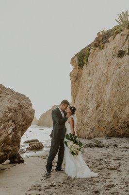 Elopement on Malibu beach, bride and groom portrait.