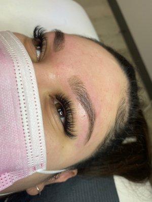 Hybrid lashes with a brow wax