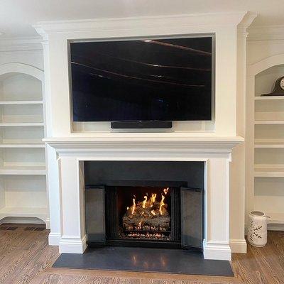 Wood Fireplace to Gas Conversion with New Glass Fireplace Doors