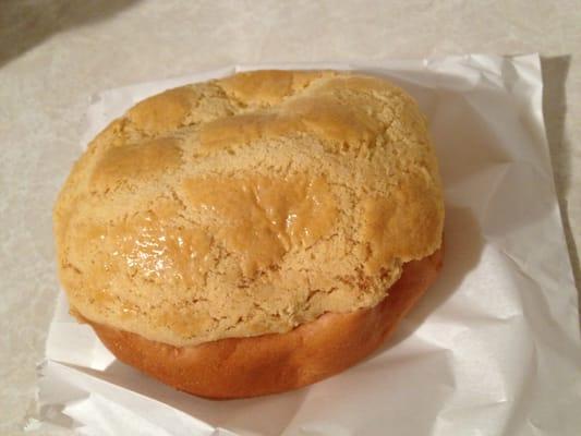 pineapple custard bun. looks innocent in the outside but within the devil beckons seductively and what she has to offer is ahhhh