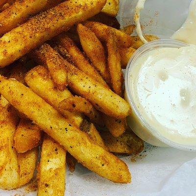 Old Bay Fries with American Cheese Sauce.