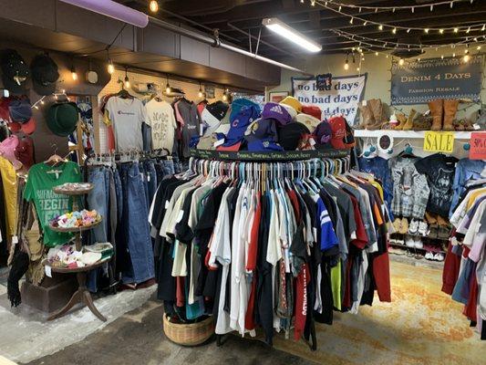 Our streetwear rack with vintage tees, sportswear, band tees, and hats