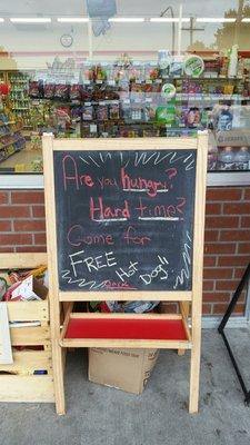 Jack made a new sign to give the hungry free hot dogs.  It is next to his box for donations to the Bellingham Food Bank.