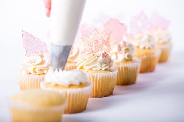 Piping shot of specialty cupcakes