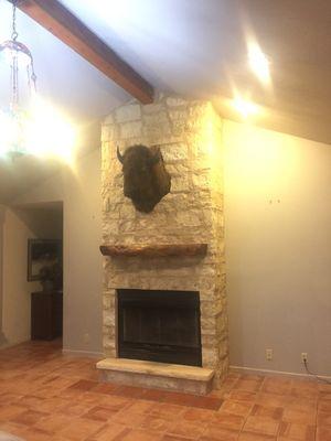 Thin stone veneer chimney; we installed thin 4",6",8" thin Veneer directly onto the sheet rock and installed a cedar mantle