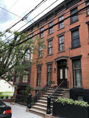 Full brownstone and brick facade restoration done by BRAVO at 245 York St, Jersey City, NJ