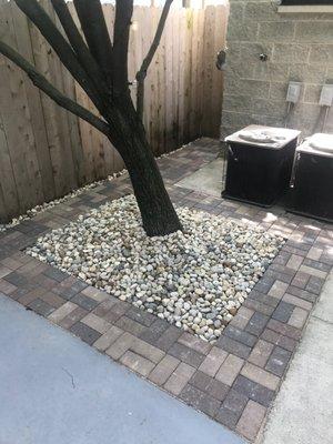 Pavers were put in perfectly with river rock filled in